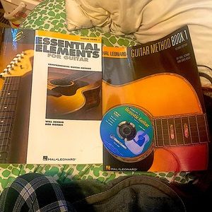 Introduction to acoustic guitar, 2 books and a CD of how to learn